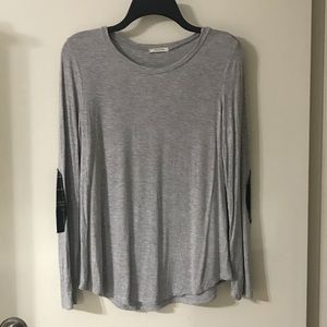 Women’s long sleeve tops. Plaid shoulder pads!